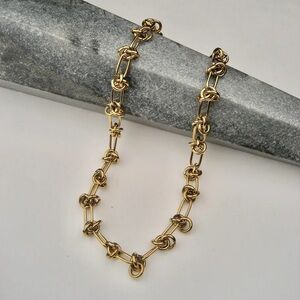 Armed Jewelry gold stainless steel knot chain necklace